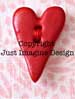 red heart ceramic button 